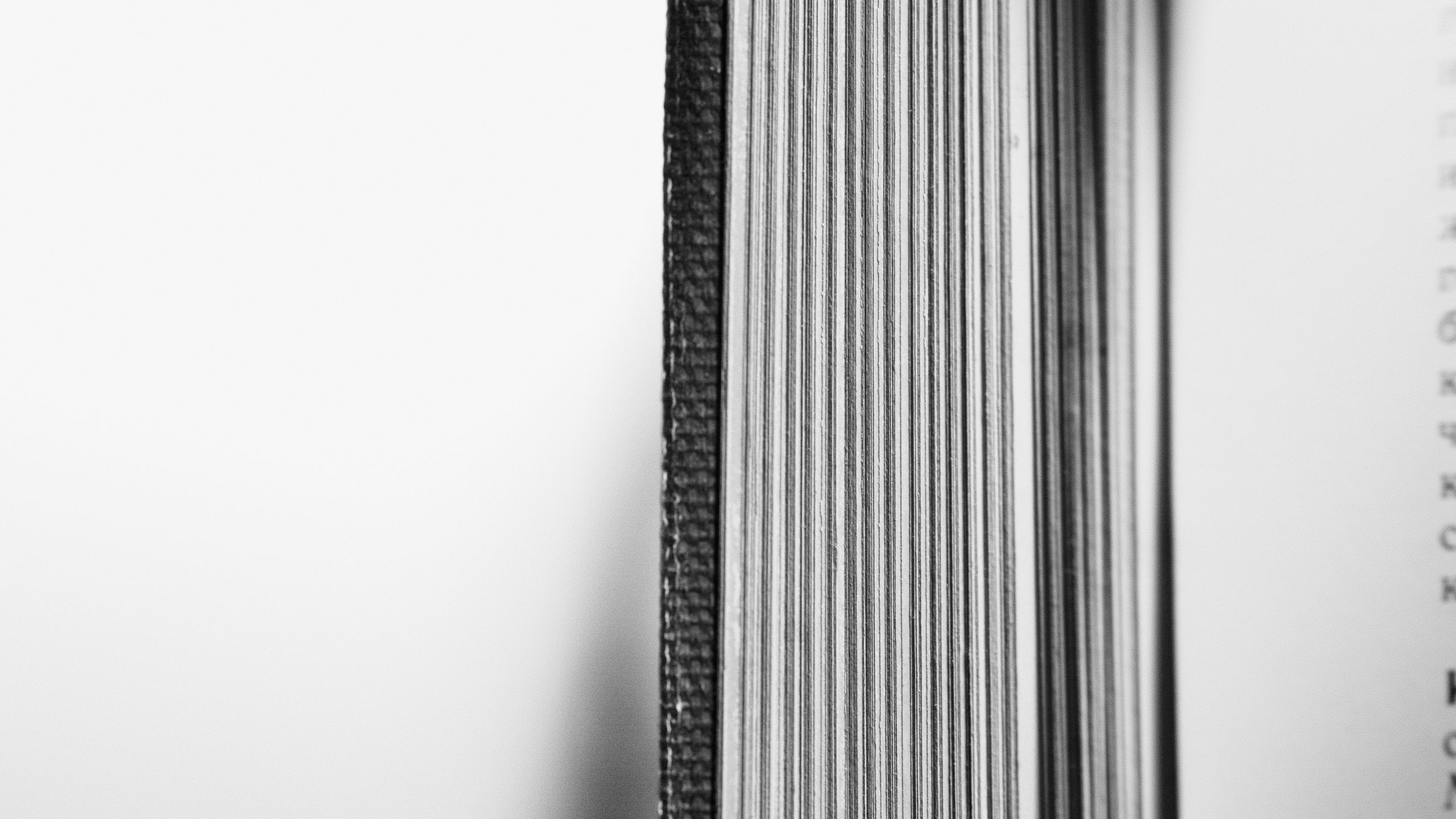 Hands binding book spine closeup