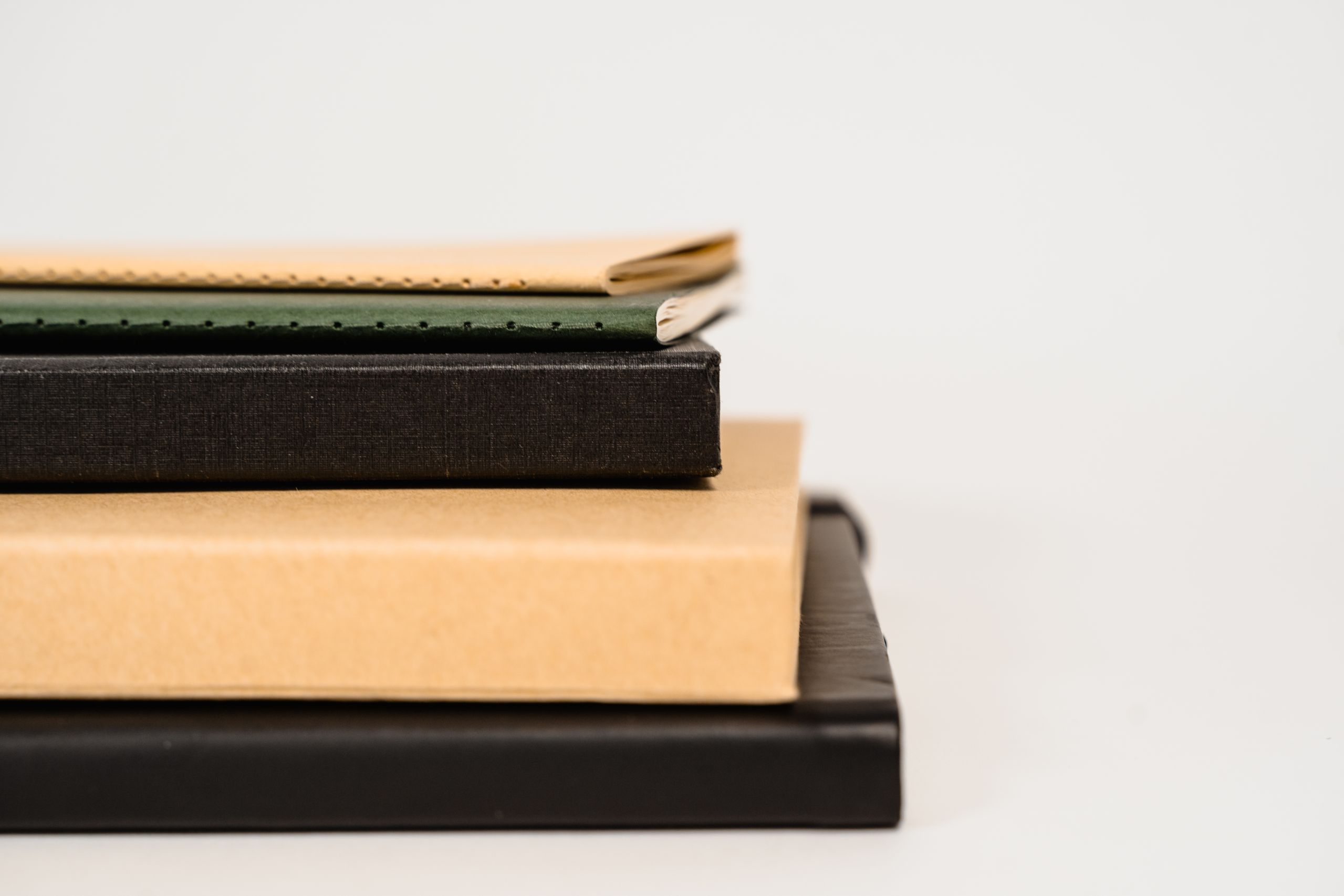 Stack of three leather journals